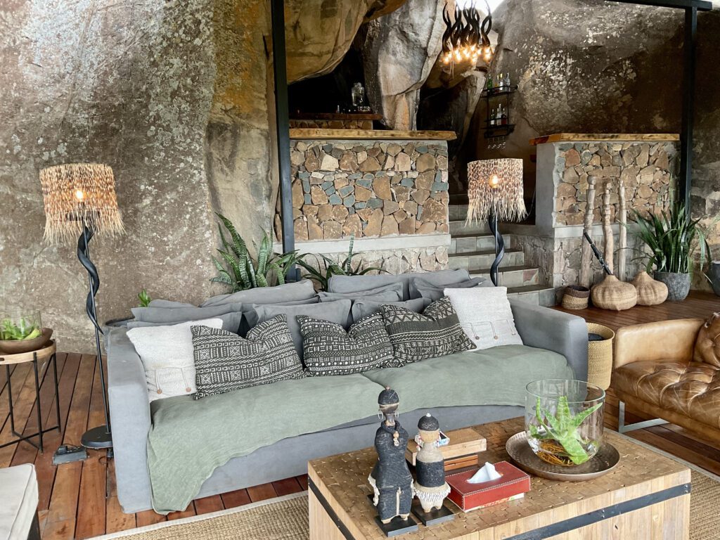 A green and blue clock with the time 1 2 : 3 0.