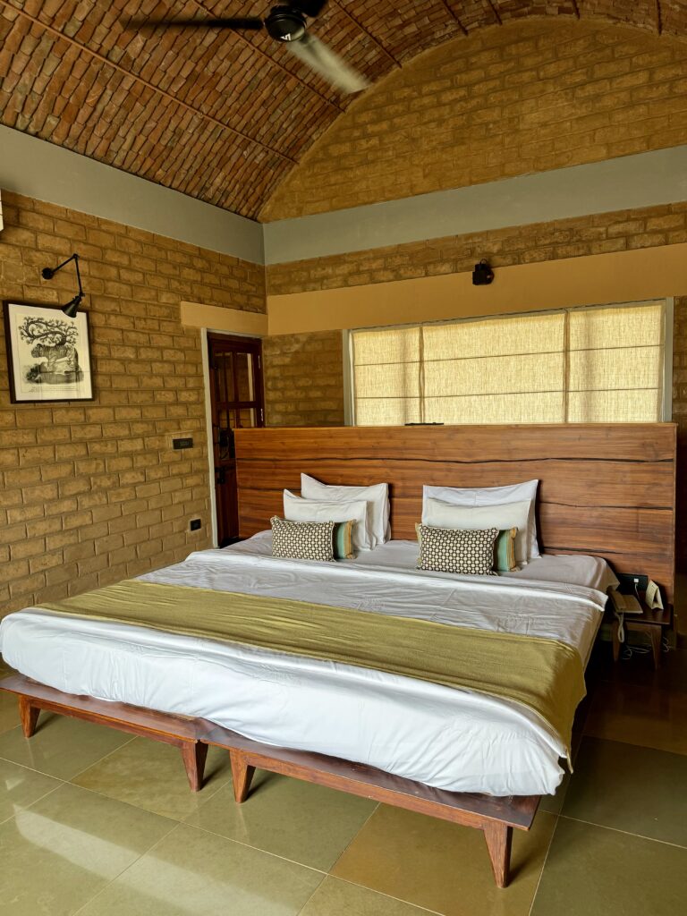 A green and blue clock with the time 1 2 : 3 0.