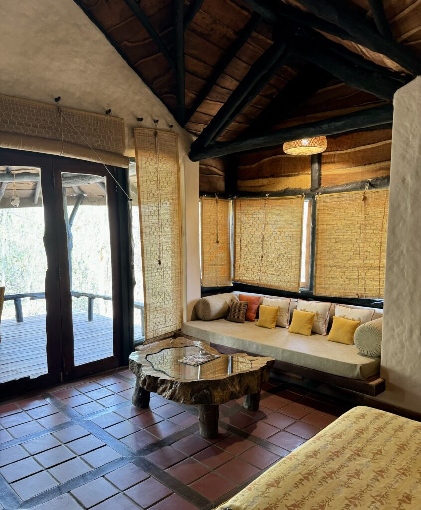 A green and blue clock with the time 1 2 : 3 0.