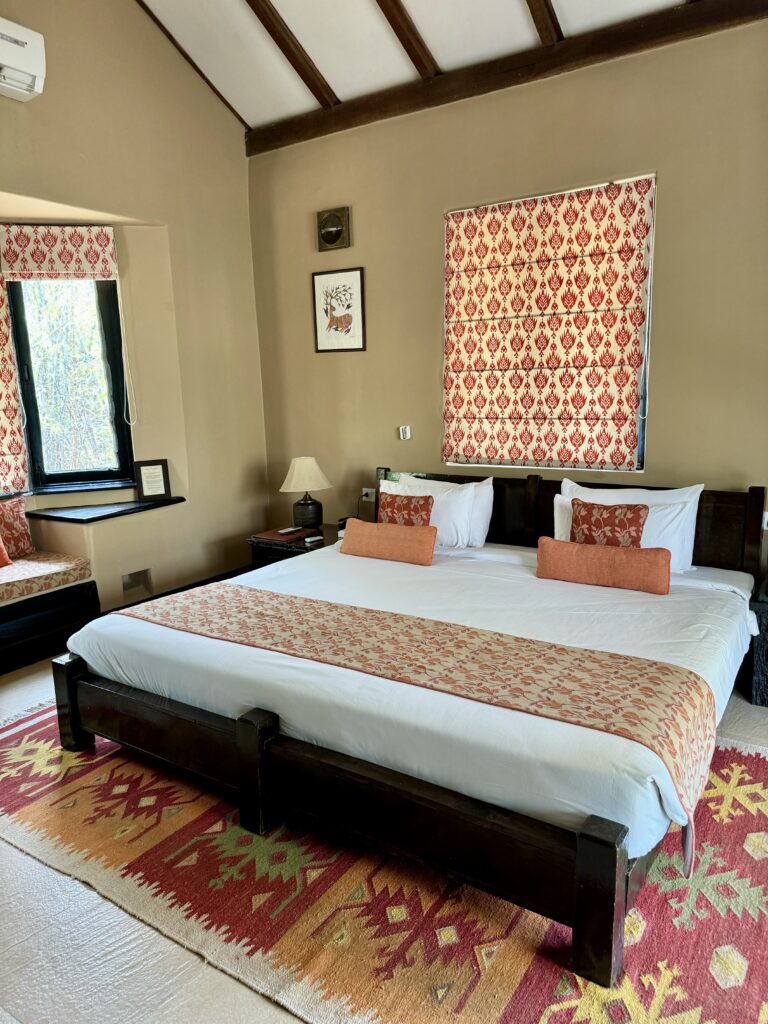 A green and blue clock with the time 1 2 : 3 0.