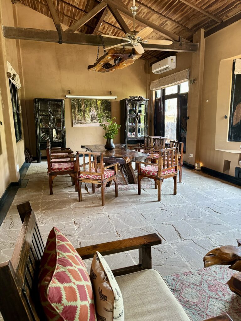 A green and blue clock with the time 1 2 : 3 0.