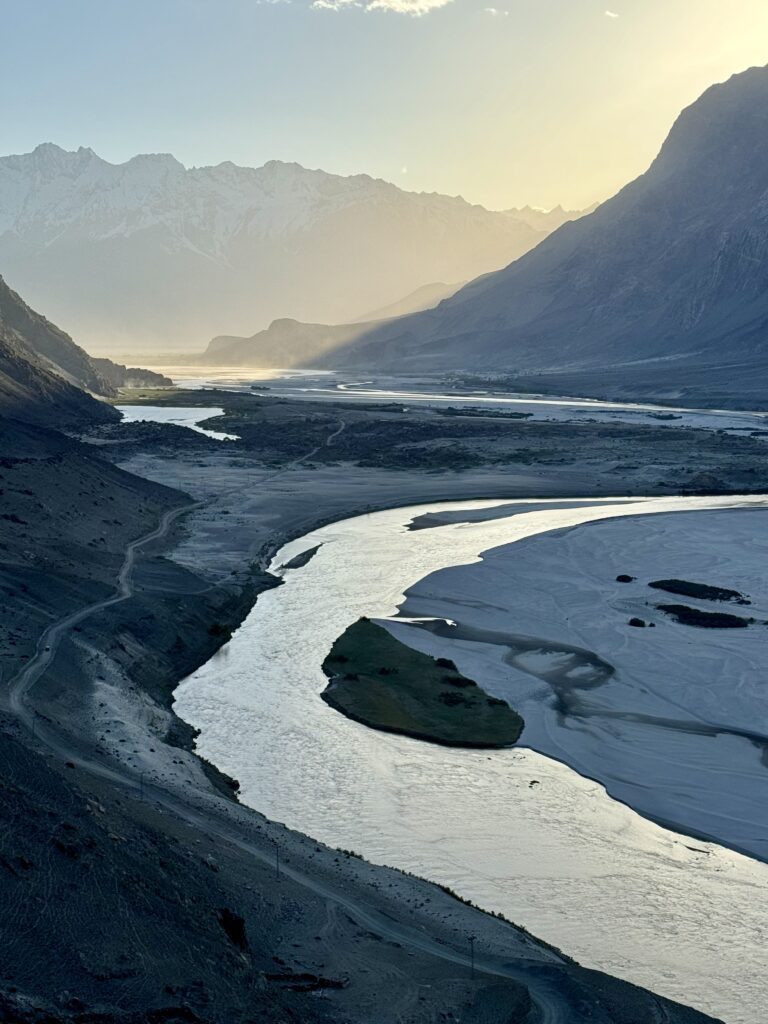A river running through the middle of a valley.