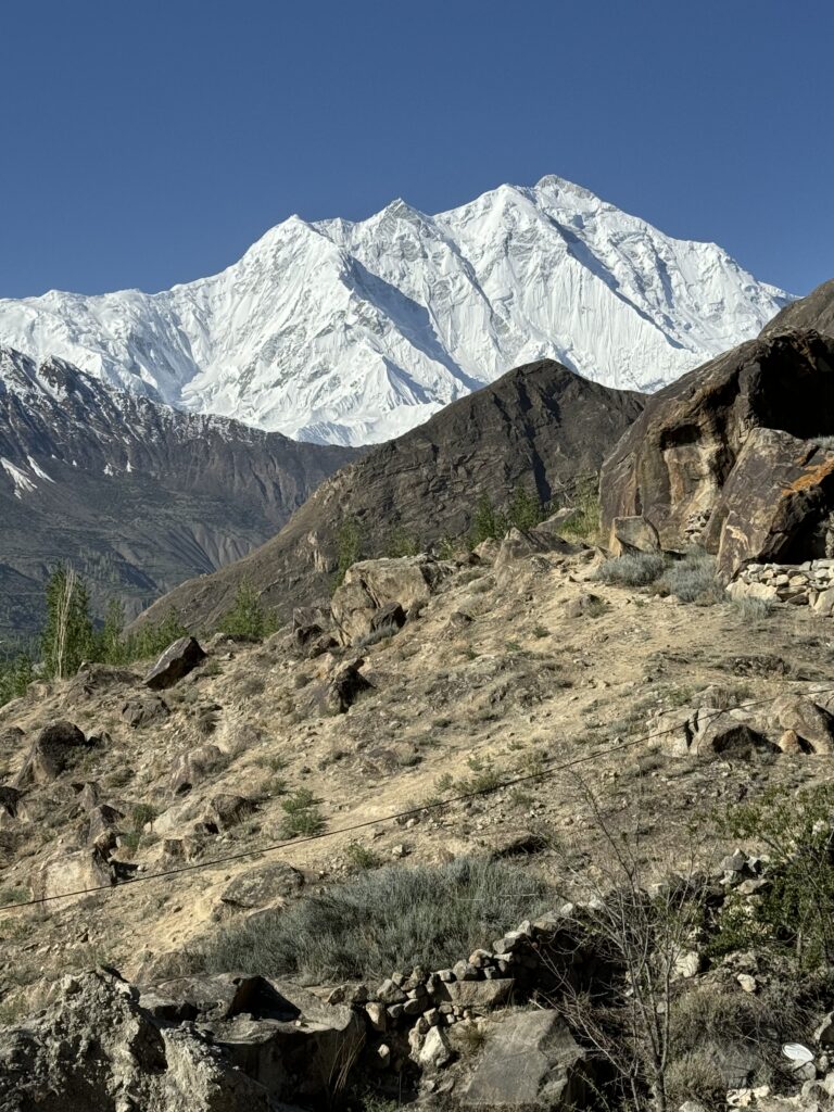 A mountain range with snow on it's side.