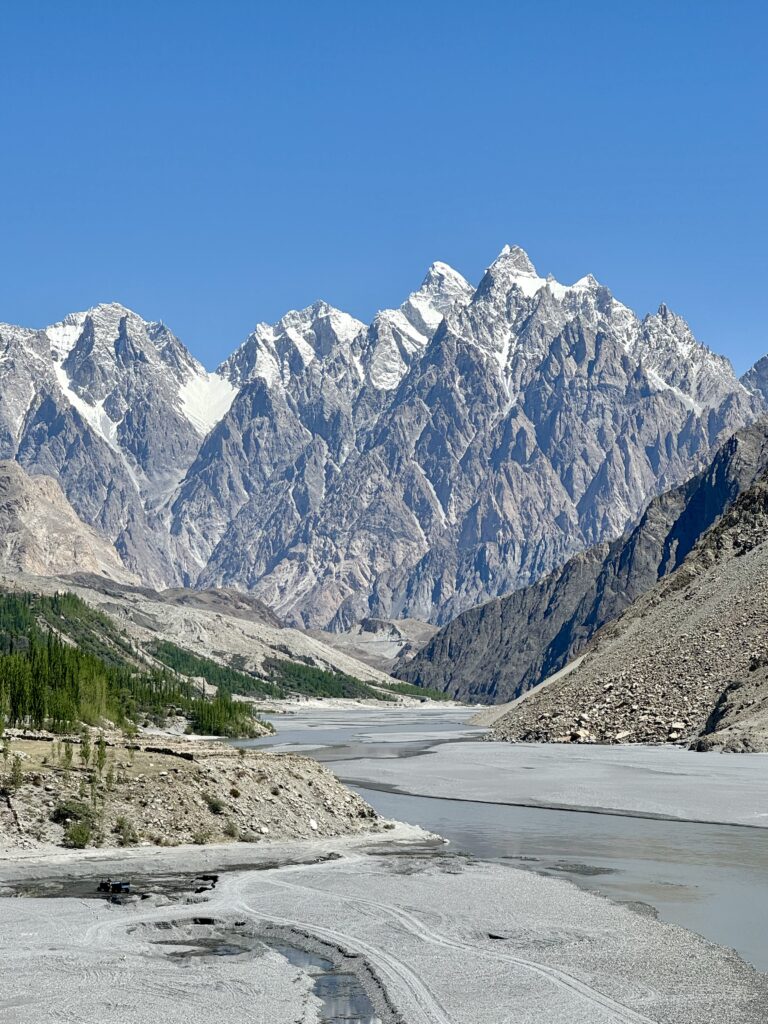 A mountain range with snow on it's sides.