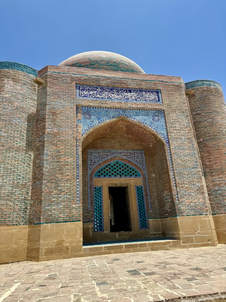 A building with blue and white tiles on the front.